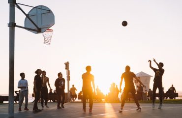group-playing-basketball